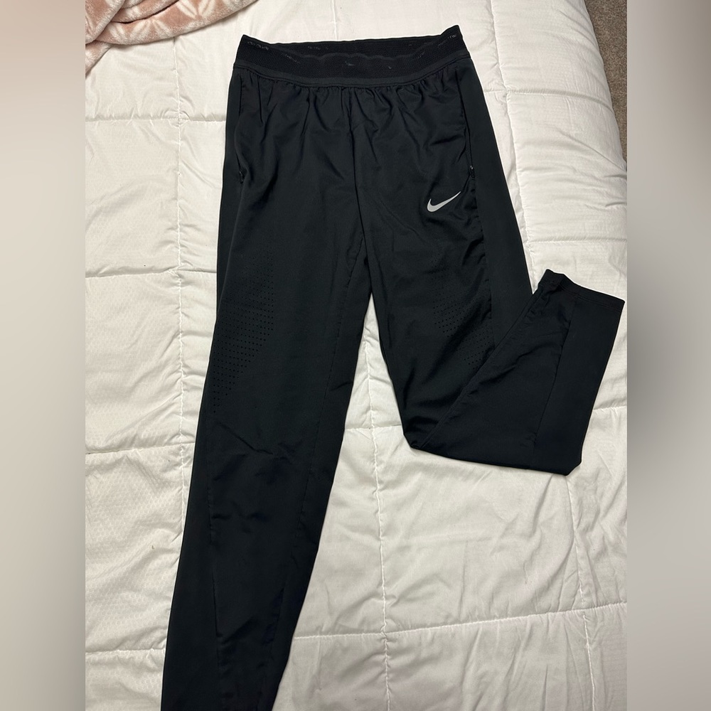 Women’s Nike running Dri Fit pants. Size Small